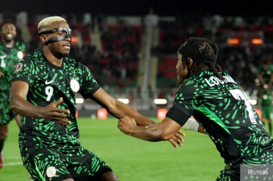Victor OSIMHEN et ADEMOLA LOOKMAN qui célèbre un but face au Mozambique can 2025 image reuters