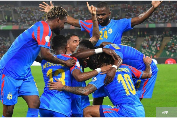 Joueurs congolais qui célèbre un but , lors des matchs de qualification pour la coupe du monde 