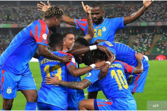 Joueurs congolais qui célèbre un but , lors des matchs de qualification pour la coupe du monde 