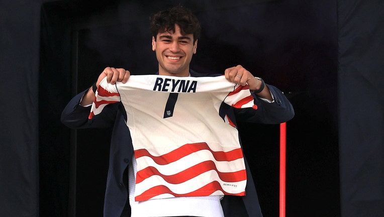 article USA's midfielder Gio Reyna poses with his jersey during the announcement of the The US Men's National Team's 2026 World Cup roster is announced in New York, on May 26, 2026. (Photo by TIMOTHY A. CLARY / AFP via Getty Images)