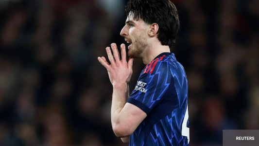 Deckan Rice avec le maillot extérieur d'Arsenal 